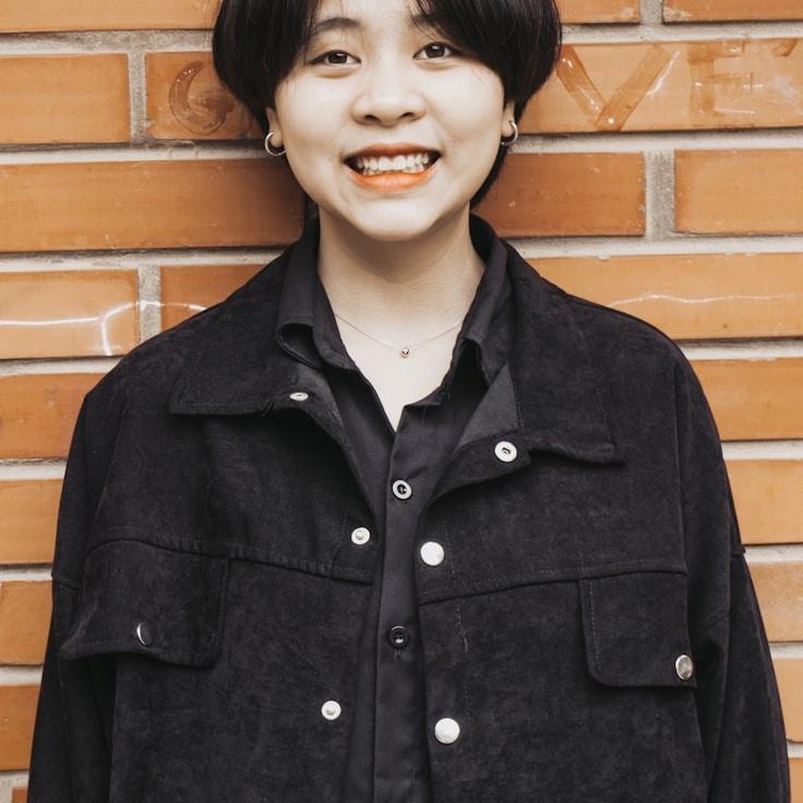 Kaveri Mehta, Lead Design Curator at RidgePaperPost, reviewing corporate floral arrangements